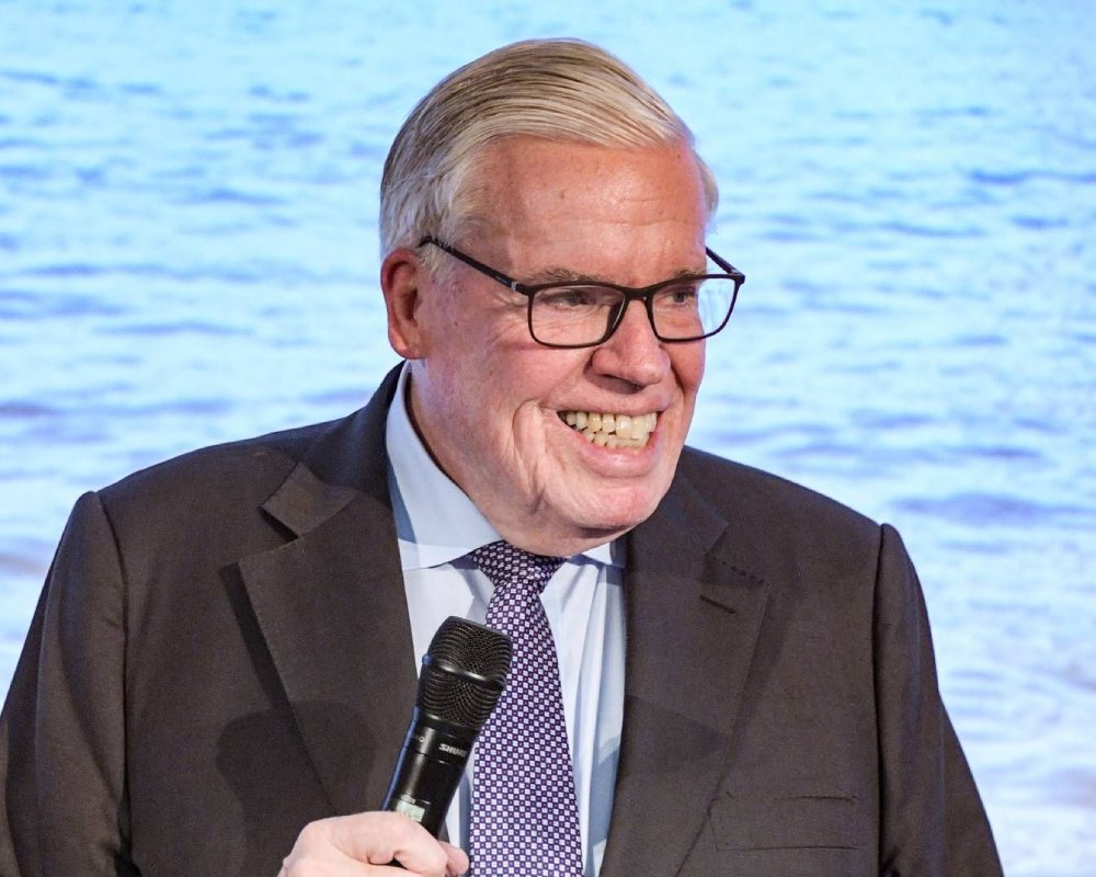 Klaus-Michael Kuehne in a conference